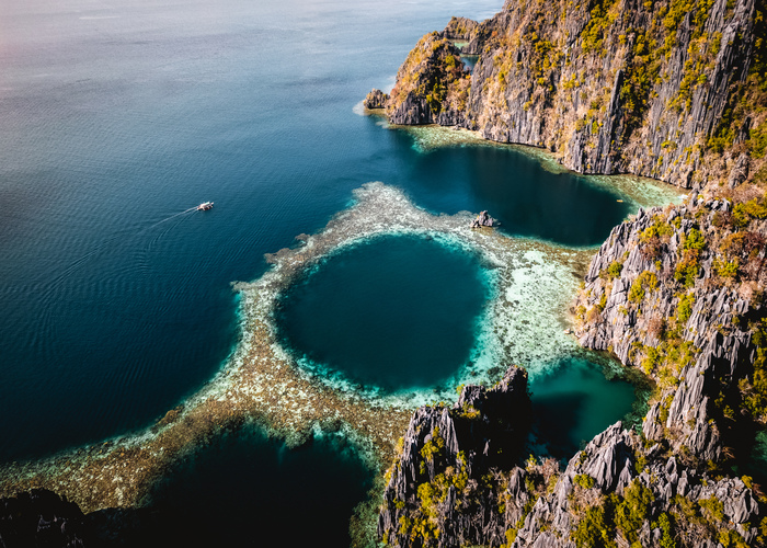 Aerial view of Twin Lagoon turquoise waters with a drone The Philippines Coron . High quality photo